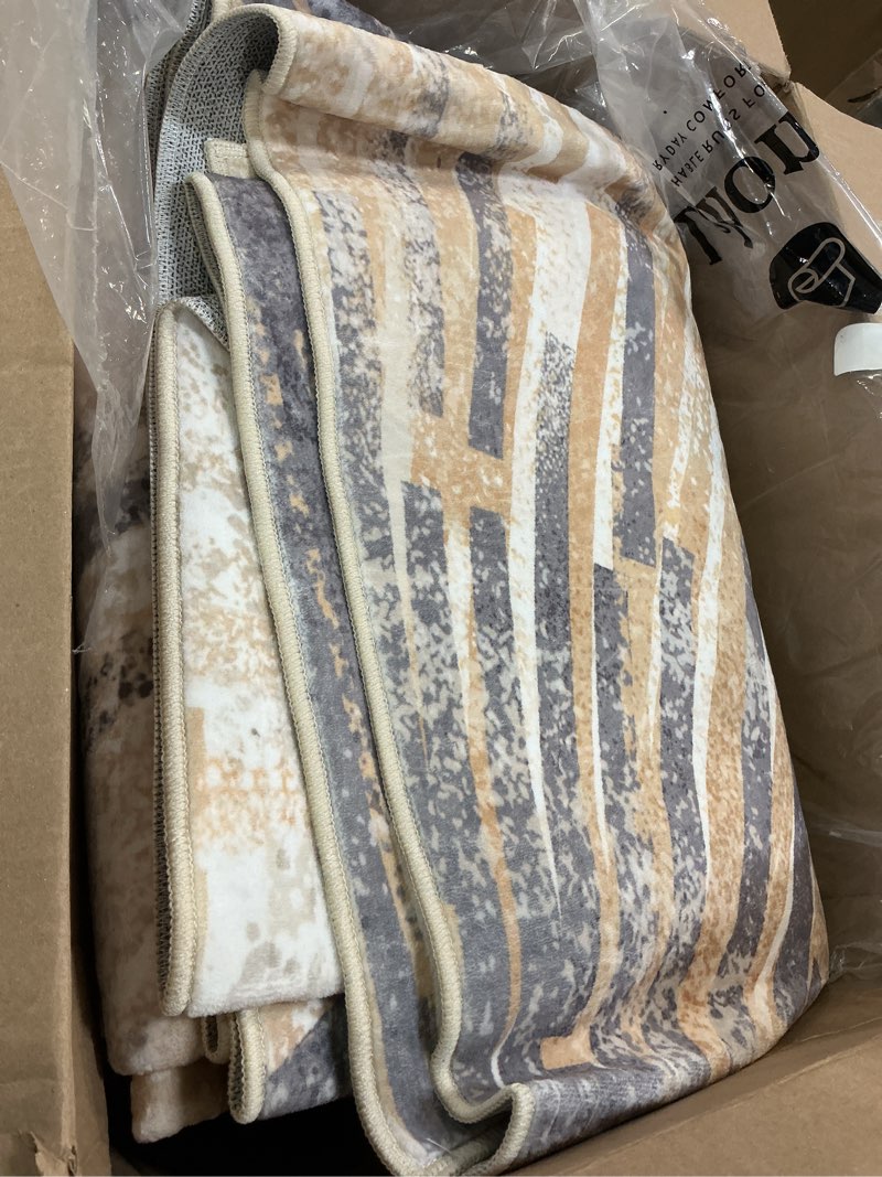 Condition photo showing Good Condition for Lahome Modern Washable Area Rugs 8x10 - Ultra-Thin Non-Slip Soft Velvet Abstract Living Room Rug Starburst Floor Rugs, Abstract Print Washable Rug for Dining Room Table Office (Gold/Gray, 8'x10') 8' x 10' (Rectangular) Gold/Gray