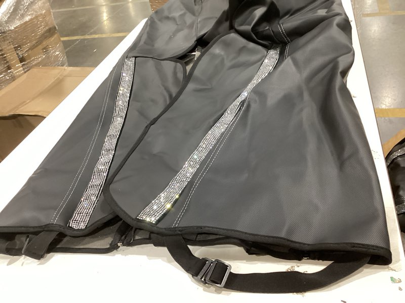 Condition photo showing As Is for car seat cover, black with gems, unknown size