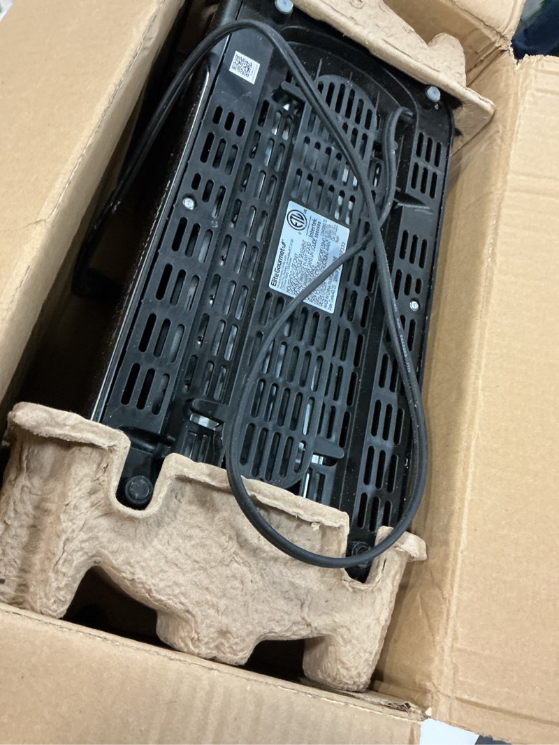 Condition photo showing As Is for elite gourmet ect-3100 long slot 4 slice toaster, reheat, 6 toast settings, defrost, cancel functions, built-in warming rack, extra wide slots for bagels & waffles, stainless steel & black 4 slice matte black