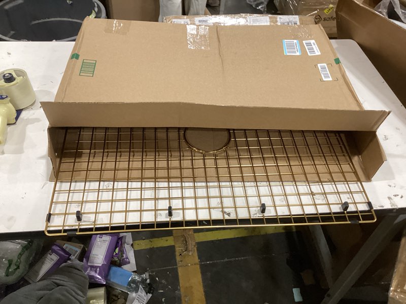 Condition photo showing As Is for Starstar Sinks Protector Matte Gold 304 Stainless Steel Kitchen Sink Bottom Grid, Rack (26 L x 14-3/8 W)
