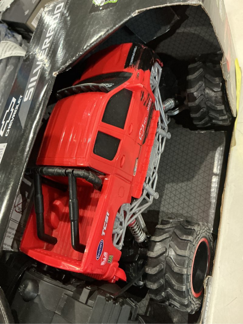 Condition photo showing As Is for adventure force 1:24 silverado 4x4 radio control cars