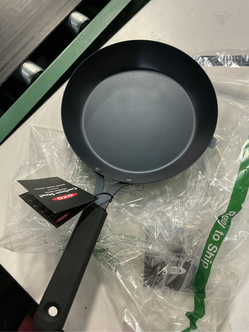 Condition photo showing Good Condition for oxo obsidian pre-seasoned carbon steel, 10" frying pan skillet with removable silicone handle holder, induction, oven safe, black