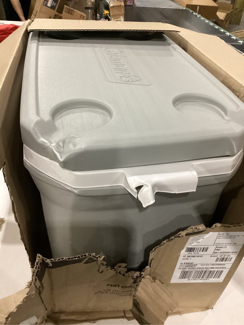 Condition photo showing As Is for damage on lid broken handle coleman classic series insulated portable cooler, leak-resistant outdoor hard cooler keeps ice up to 5 days, 52/70/120/150 quart