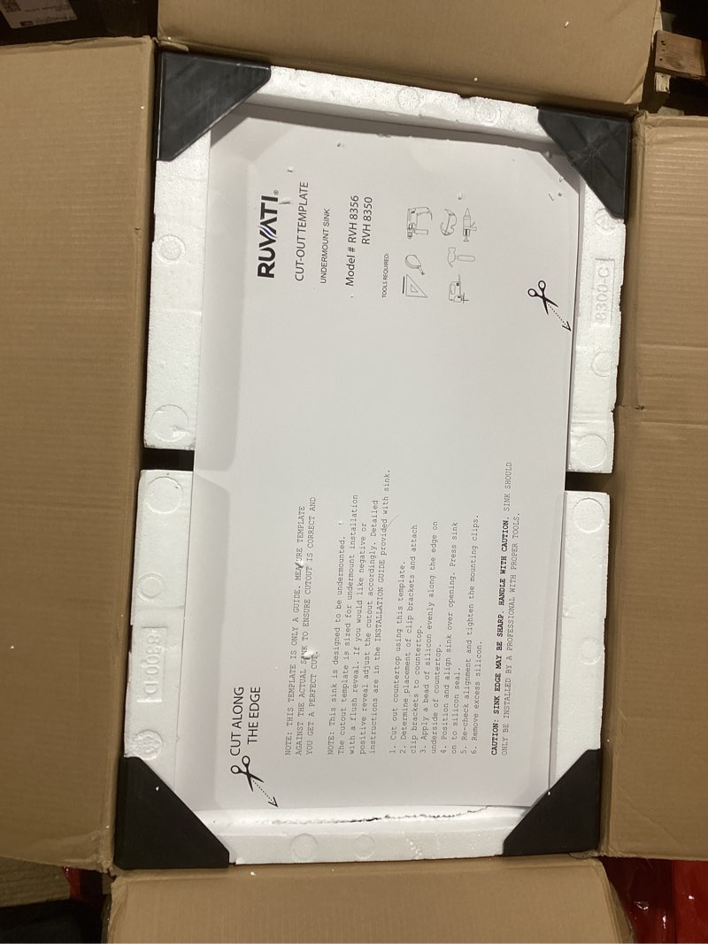 Condition photo showing As Is for Ruvati RVH8350 33-inch Workstation Ledge 50/50 Double Bowl Undermount 16 Gauge Stainless Steel Kitchen Sink 33-inch 50/50