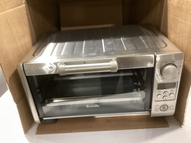 Condition photo showing As Is for Breville BOV450XL Mini Smart Countertop Oven and Toaster Oven, Small, Brushed Stainless Steel