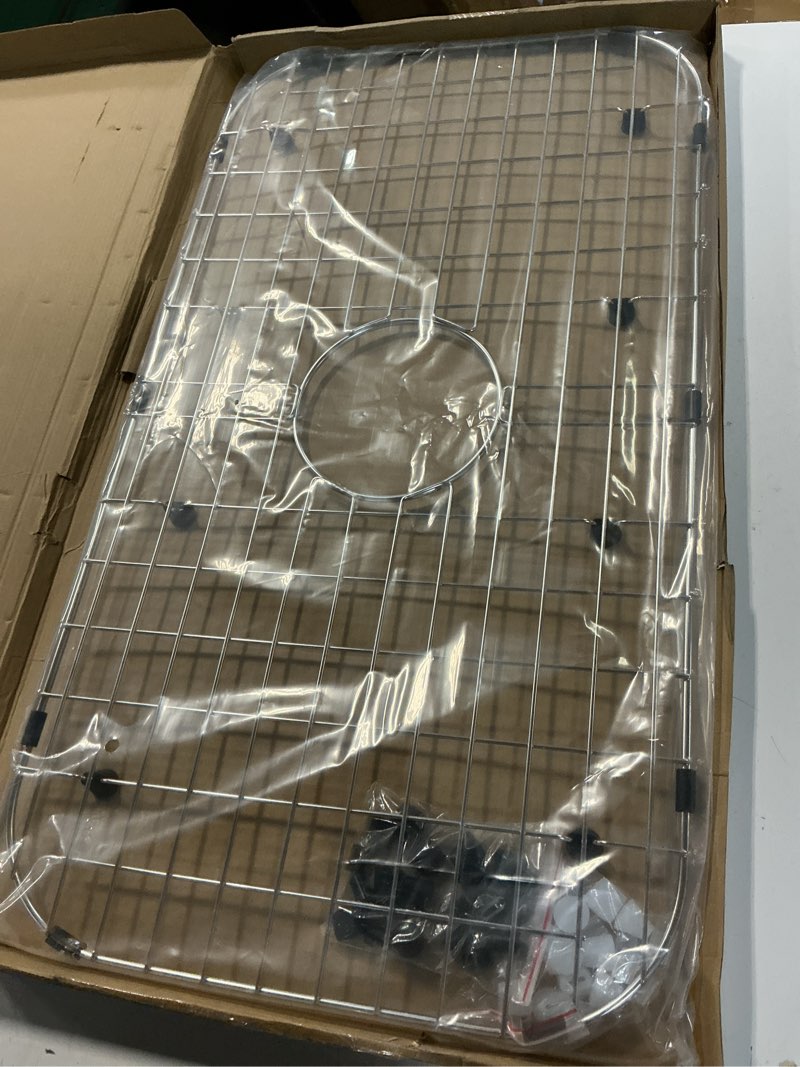 Condition photo showing Good Condition for serene valley sink protector grid 26-1/16" x 14-1/16", centered drain with corner radius 3-1/2", 304 stainless steel material nlw2614c