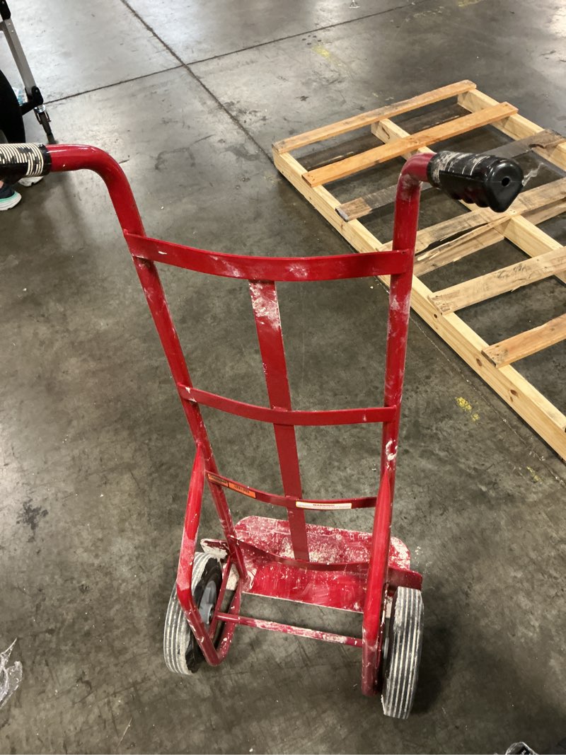 Condition photo showing As Is for milwaukee milwaukee dual handle truck with stair climbers
