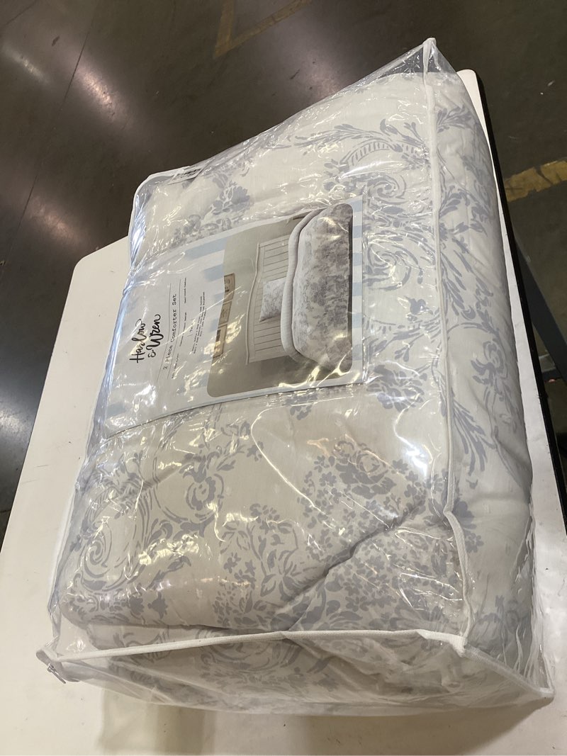 Condition photo showing As Is for twin ruffle comforter set blue floral
