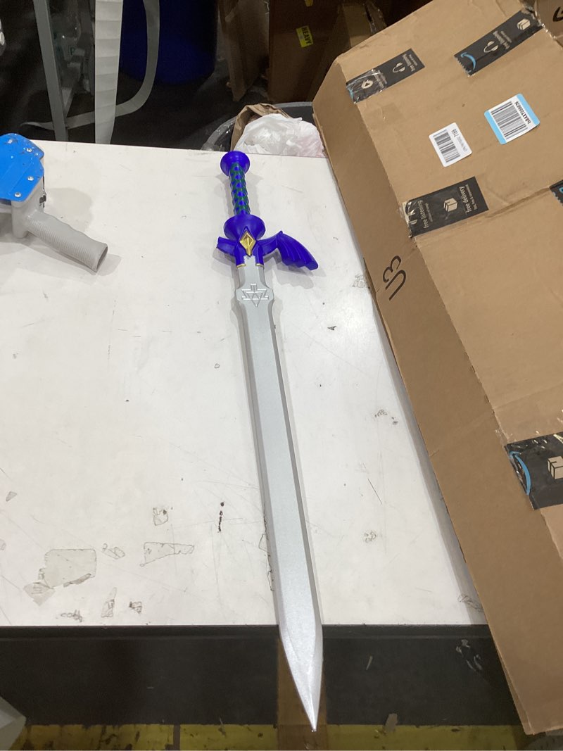 Condition photo showing As Is for zelda master sword with scabbard | sword of link | 26 1/2" stainless steel blade | 36" overall length | abs handle and scabbard | iconic video game replica
