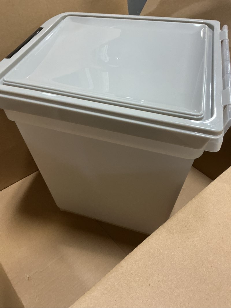 Condition photo showing Good Condition for IRIS USA Airtight Dog Food Storage Container, WeatherPro, Up to 25 lbs, Removable Wheels, for Dog Cat Bird and Other Pet Food Storage Bin, Keep Fresh, Translucent Body, Made in USA, Clear/Gray 25 lbs Clear/Gray