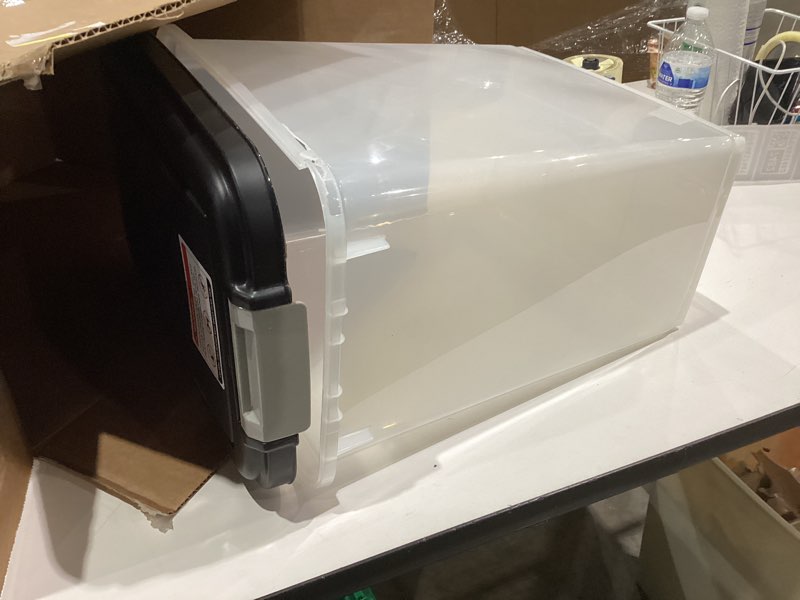 Condition photo showing As Is for IRIS USA Dog Food Storage Container, 30 lbs & 11 lbs Combo, Cat Food Storage Container, Dog Treat Container, Airtight, Stackable, 2-Cup Scoop, Wheels, Easy Mobility, Black 30 lbs + 11 lbs Black