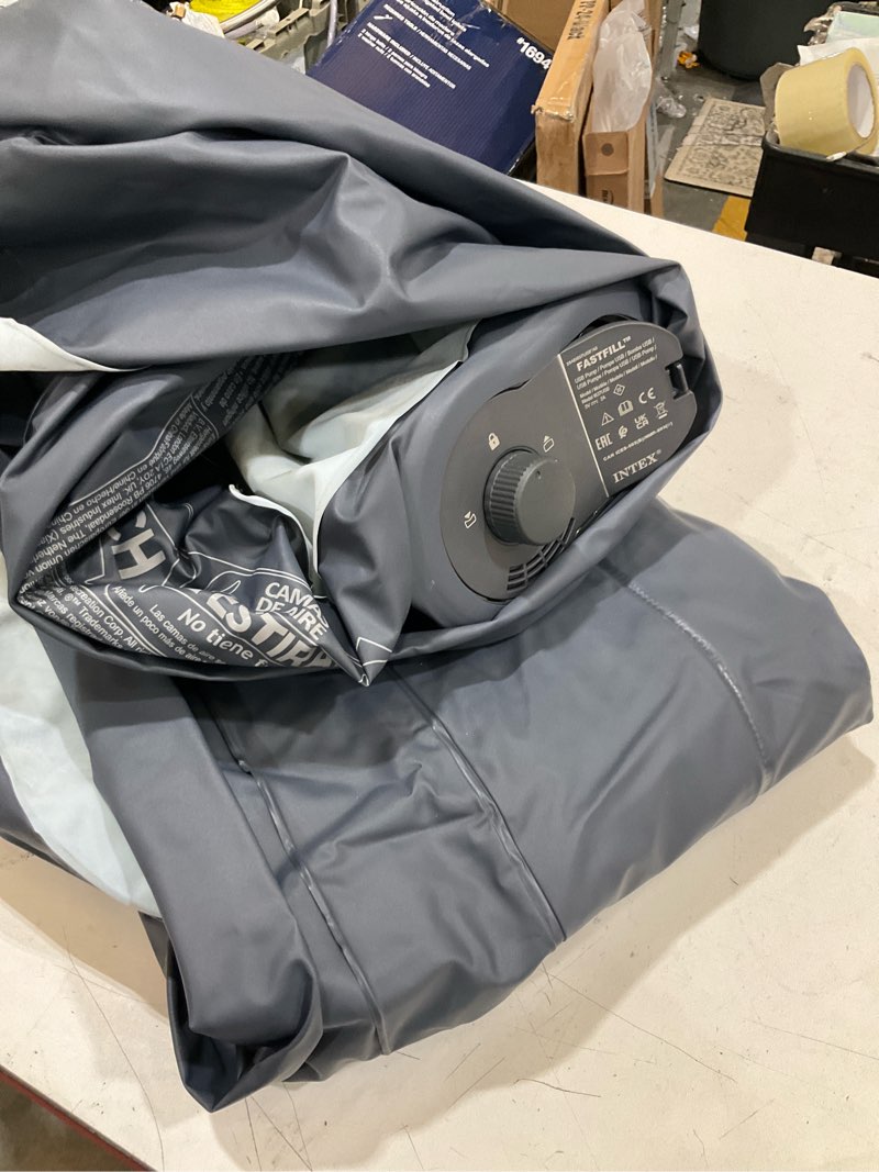Condition photo showing As Is for intex air bed