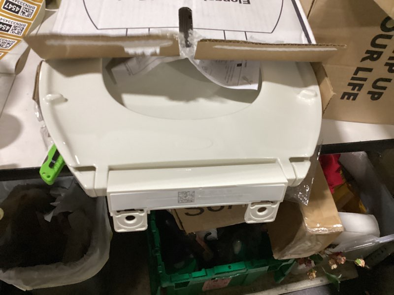 Condition photo showing As Is for kohler 20110-96 brevia, slow close toilet seat, elongated toilet seat, grip-tight bumpers quick-attach hardware, biscuit biscuit elongated quiet-close