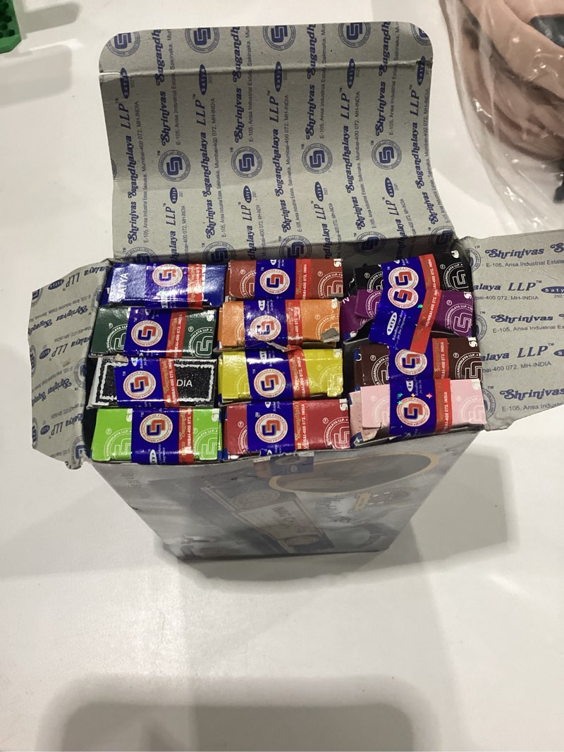 Condition photo showing New/Like New for satya incense variety pack of 12. each is a 15g box - nag champa, jasmine blossom, midnight, sandalwood, patchouli forest, blessing, super hit, celestial, rain forest, fortune, romance, sunrise