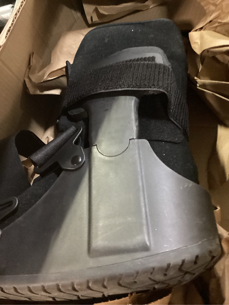 Condition photo showing As Is for United Ortho USA14115 Short Air Cam Walker Fracture Boot, Medium, Black Black Medium Boot