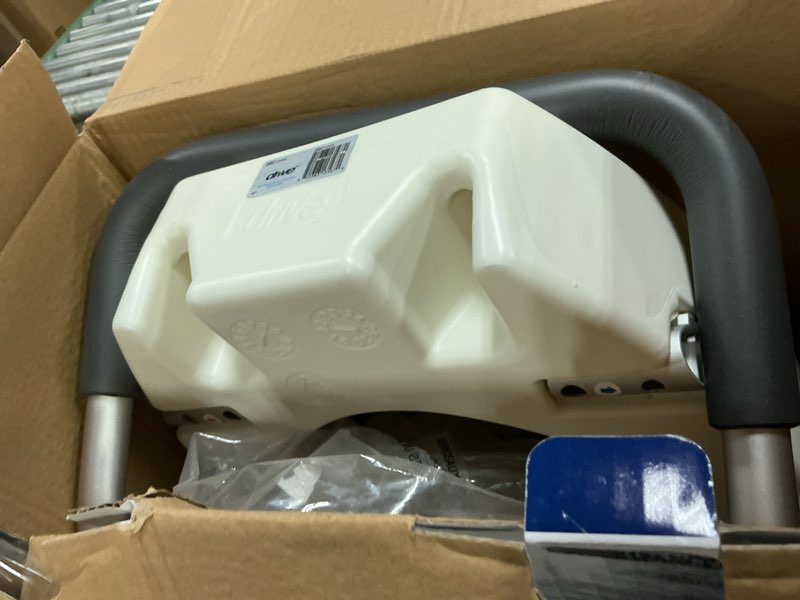 Condition photo showing As Is for drive medical 12402 premium raised toilet seat with removable metal arms, standard seat, white