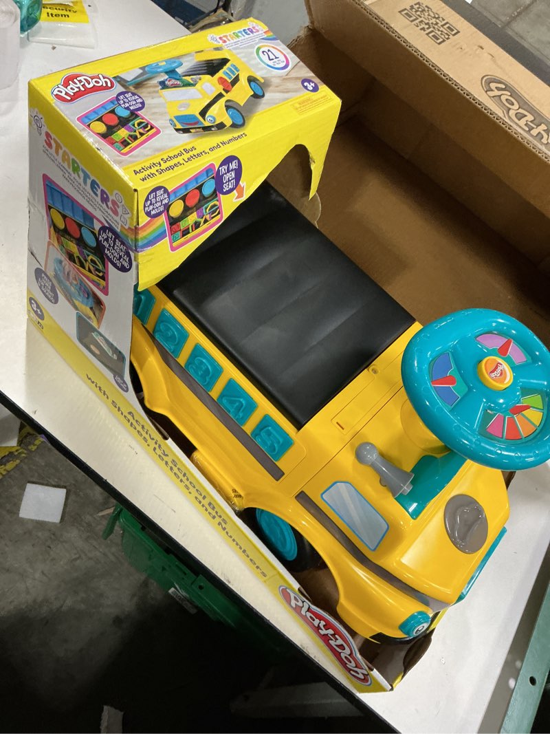 Condition photo showing New/Like New for Play-Doh Activity School Bus - Push and Ride On Toy Car for Kids Up to 44 Lbs, Lights and Sounds. Includes Shape and Number Cutters, Play Doh Set, Kids Ride On Toy, Push Car for Girls and Boys
