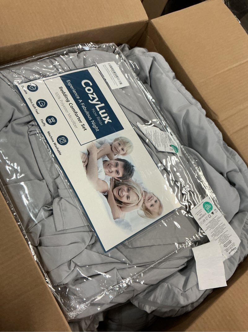 Condition photo showing As Is for CozyLux Queen Comforter Set Light Grey Seersucker 7 Pieces Bed in a Bag Queen Comforter Set with Sheets Luxury Soft Bedding Set with Down Alternative Comforter, Sheets, Pillowcases & Shams All Seasons Light Grey Queen