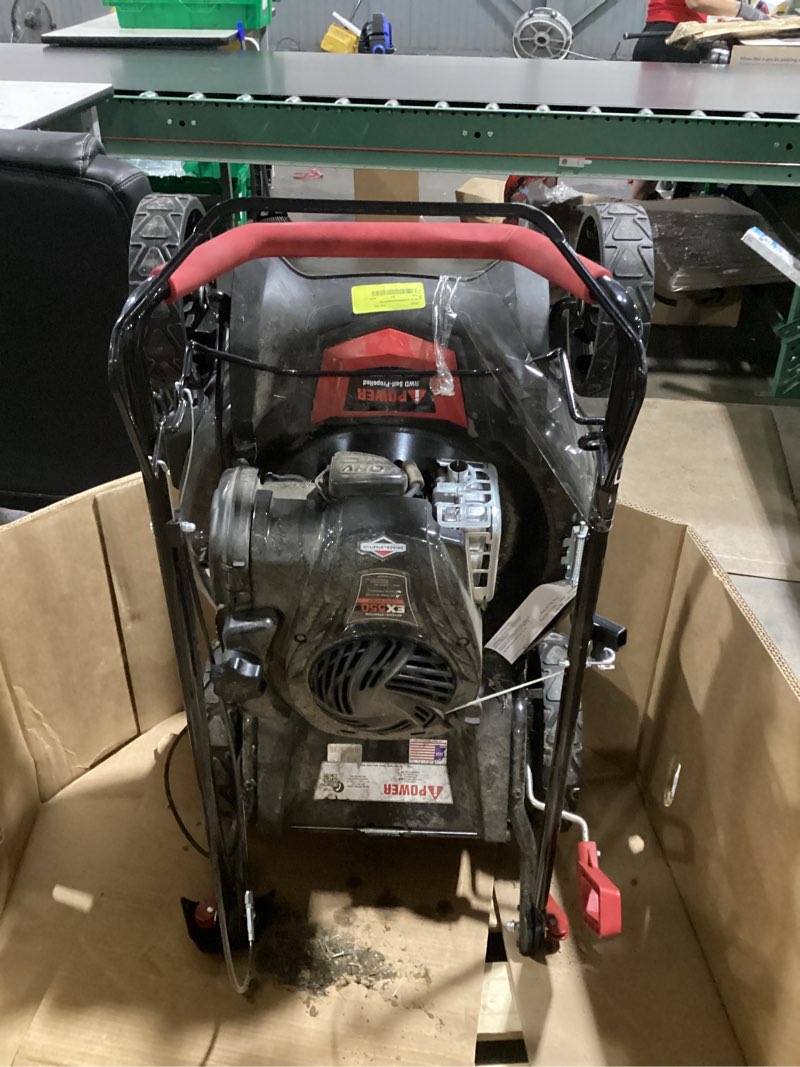 Condition photo showing As Is for briggs and stratton ex 550lawn mower