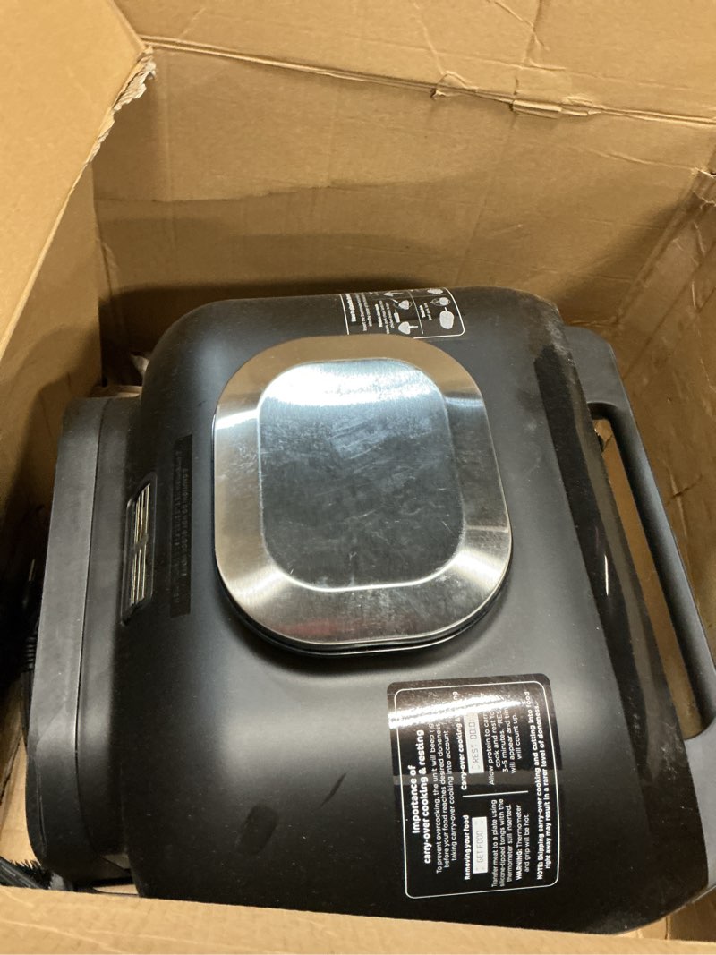 Condition photo showing As Is for ninja | indoor grill and air fryer| foodi smart xl | 6-in-1 grill, air fry, roast, bake, broil, dehydrate & crisp |smart thermometer & splatter shield | dishwasher safe parts | black/silver | fg551 6-in-1 with thermometer
