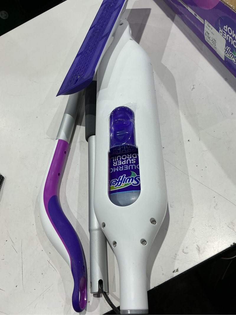 Condition photo showing As Is for swiffer powermop multi-surface mop kit for floor cleaning, fresh scent, mopping kit includes powermop, 2 mopping pad refills, 1 floor cleaning solution with fresh scent and 2 batteries purple and white