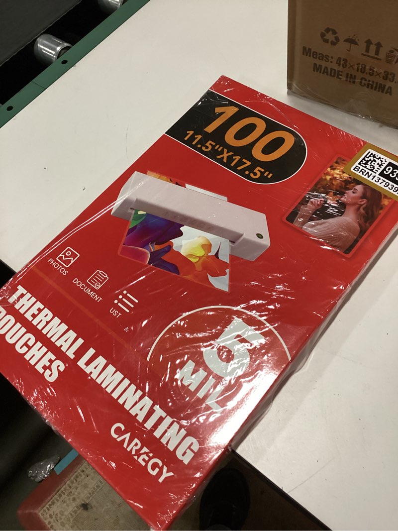 Condition photo showing New/Like New for CAREGY 100 Pack Laminating Sheets, Hold 11 x 17 Inch Sheet, 5 Mil Clear Thermal Laminating Pouches 11.5 x 17.5 Inch Lamination Sheet Paper for Laminator, Round Corner 100PACK-5Mil (11.5 x 17.5Inches)