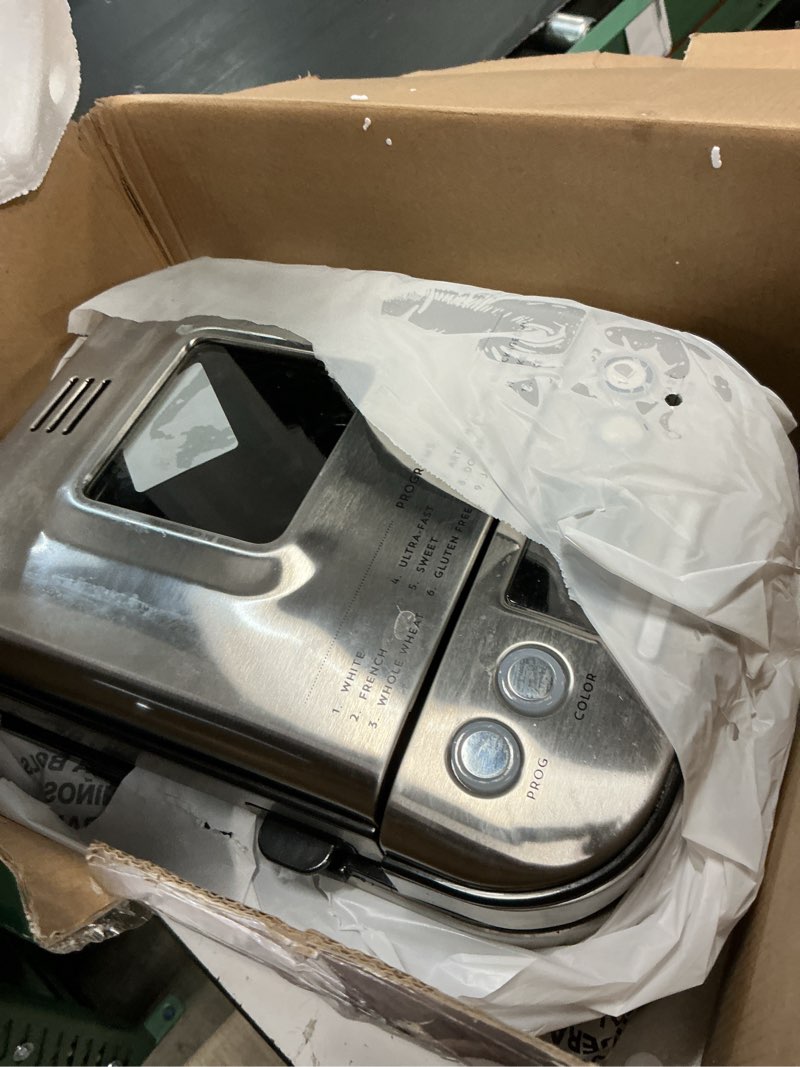 Condition photo showing As Is for cuisinart bread maker machine, stainless steel automatic bread machine with 12 menu options, 3 loaf sizes up to 2 lb., 3 crust colors, removable nonstick baking pan & kneading paddle, cbk-110nas