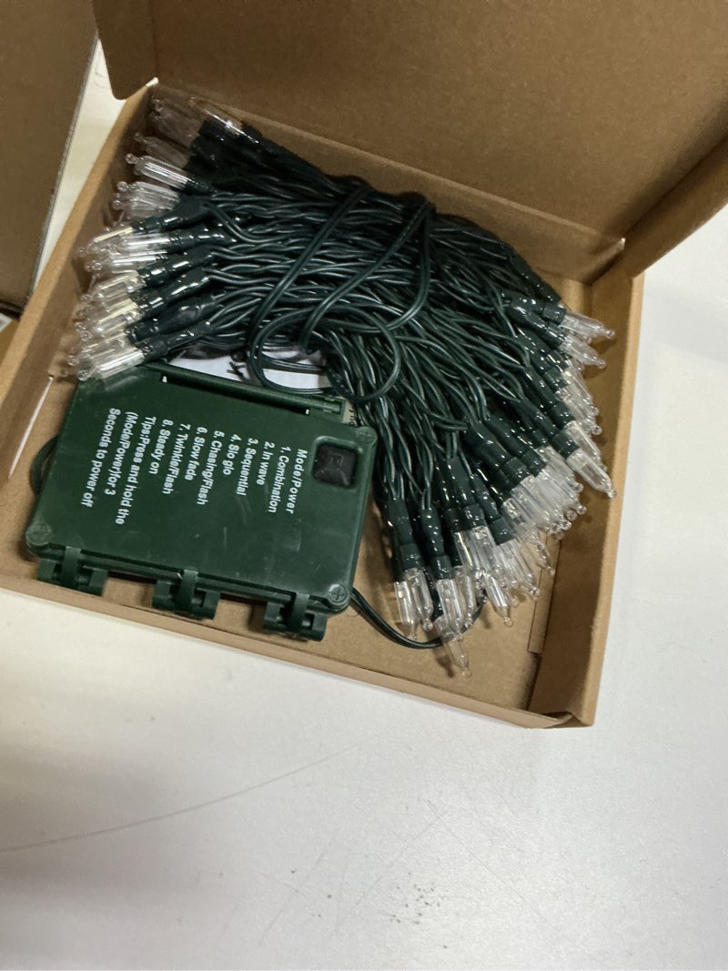 Condition photo showing Good Condition for koopower 33ft 100 LED Battery Operated String Lights with Timer (8 Modes), IP65 Waterproof for Christmas Tree, Green String, Warm White 33 ft | Battery Operated Warm White | Green Wire