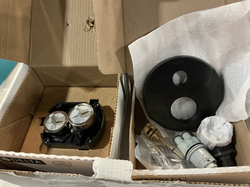 Condition photo showing Good Condition for delta modern 14 series round rain shower system faucet set, rainfall matte black shower head and handle set, valve trim kit, 10 inch, matte black 342702-bl