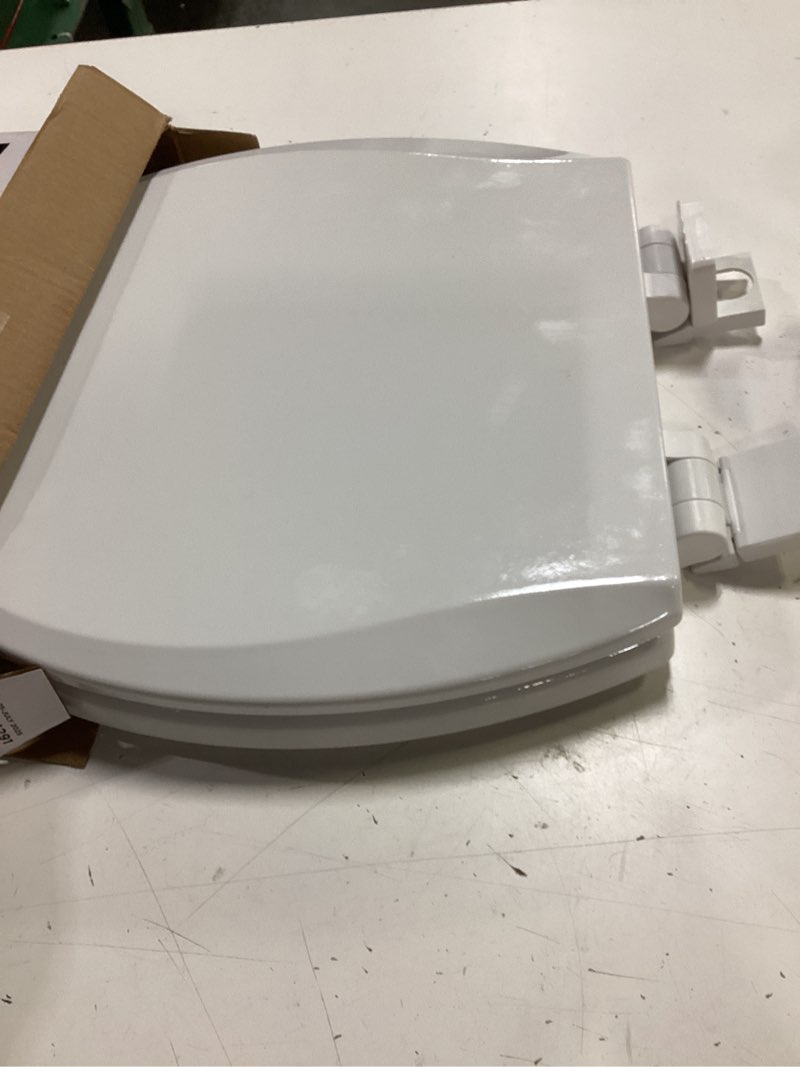 Condition photo showing As Is for american standard bedminster wood white round soft close toilet seat