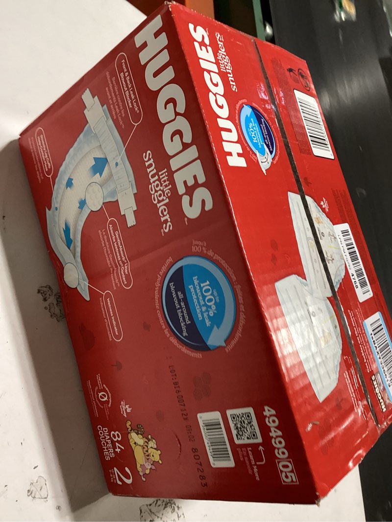 Condition photo showing New/Like New for huggies size 2 diapers, little snugglers baby diapers, size 2 (12-18 lbs), 84 count, packaging may vary size 2 84