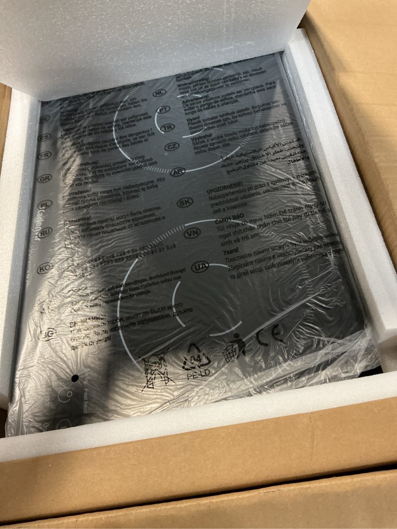 Condition photo showing As Is for 2 Burner Electric Cooktop 110v, 2000W Electric Stove Top Countertop & Built-in, Plug-in Electrics Cooktop 24 Inch, 8 Power Levels & 8 Functions, Touch Control, Safety Lock, Timer, Karienvir 24 inch black 2 burner