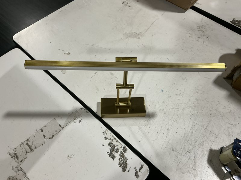 Condition photo showing As Is for brass 16 in. led picture light with remote control dimmable and swivel