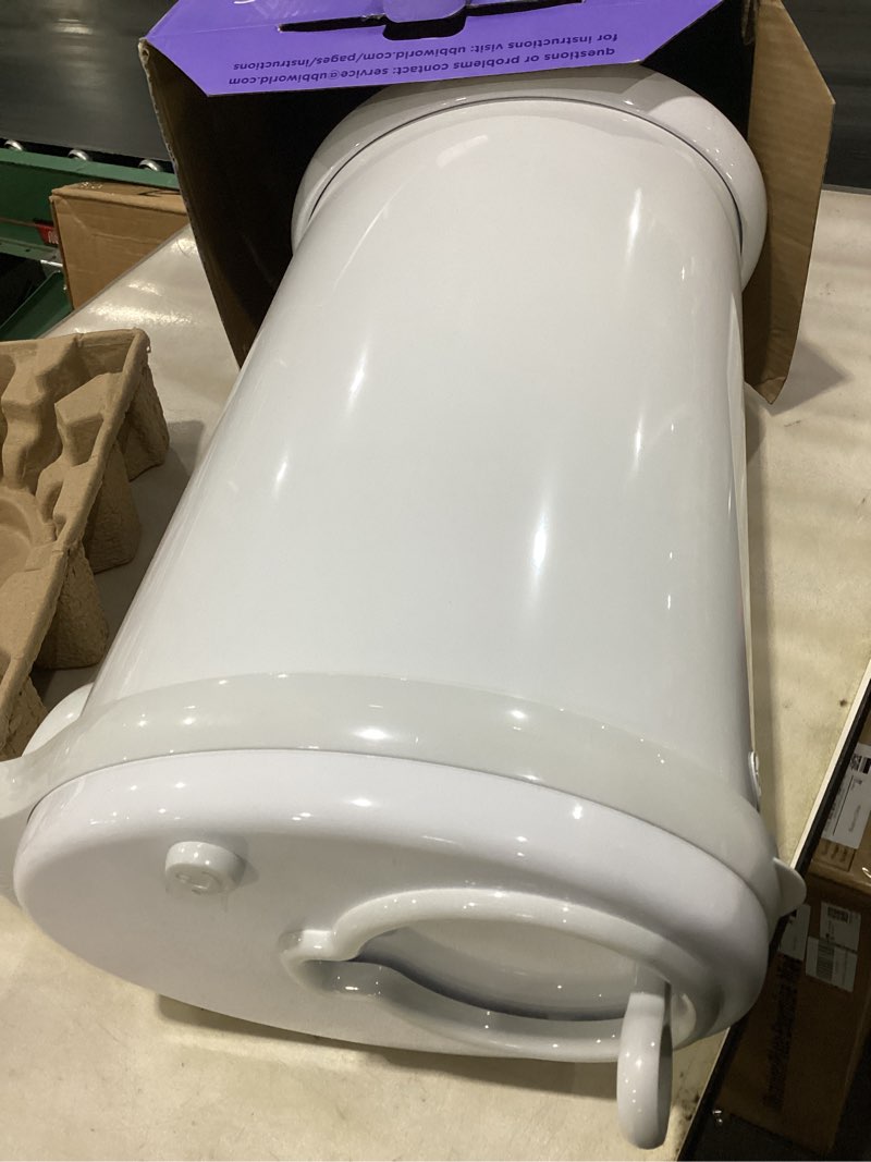 Condition photo showing New/Like New for ubbi steel diaper pail, odor locking, no special bag required, award-winning, registry must-have, white
