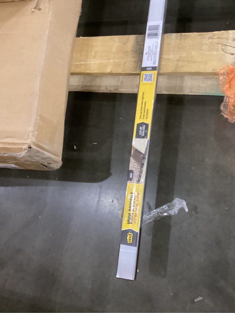 Condition photo showing Good Condition for M-D Building Products 31220 1-1/4 in. X 96 in. Brown Vinyl Divider in.T in. w/Metal Track Brown 1.25 In. X 96 In.