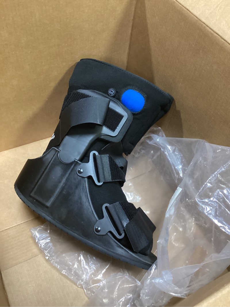 Condition photo showing Good Condition for united ortho short air cam walker fracture boot, large, black black large boot