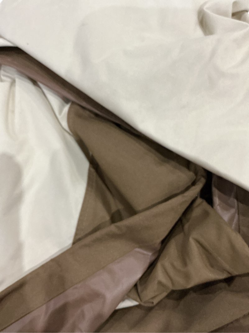 Condition photo showing As Is for amazon basics patio furniture cover, waterproof, anti-uv, wind resistant, x-large, durable, beige/tan, 130" x 84" 130"x84"