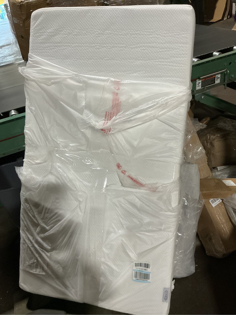 Condition photo showing As Is for nature bee organics 2-stage mini crib & toddler mattress