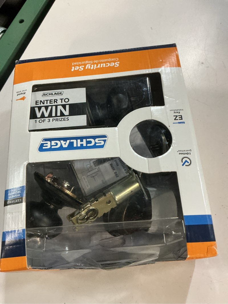 Condition photo showing As Is for schlage fb50nvgeo716 georgian entry deadbolt lock, aged bronze pack of 1 aged bronze