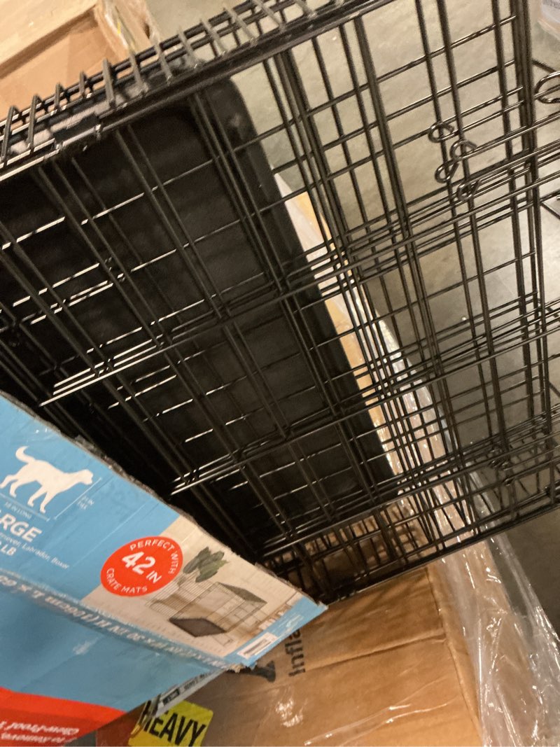 Condition photo showing Good Condition for amazon basics - durable, foldable metal wire dog crate with tray, single door, 30 x 19 x 21 in, black 30.0"l x 19.0"w x 21.0"h single door w/ divider