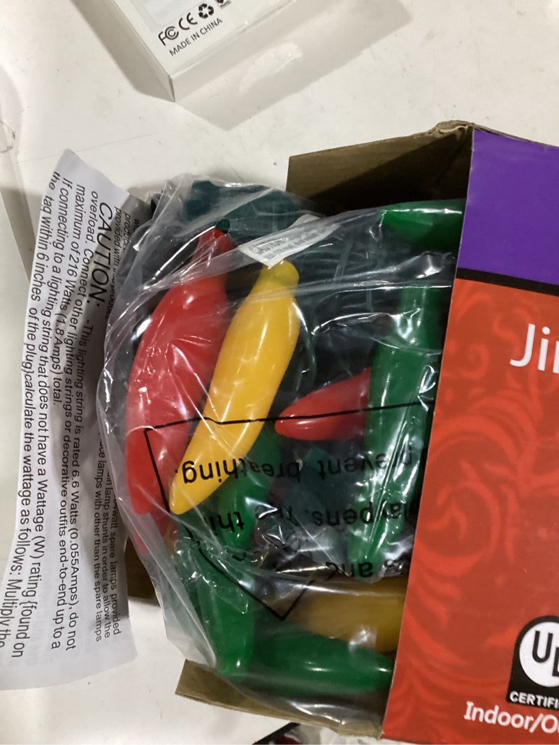 Condition photo showing New/Like New for 35 led red green and yellow chili pepper christmas lights, 18 ft green wire house decorative lighting string, for indoor and outdoor party, kitchen, living room, garden, patio.