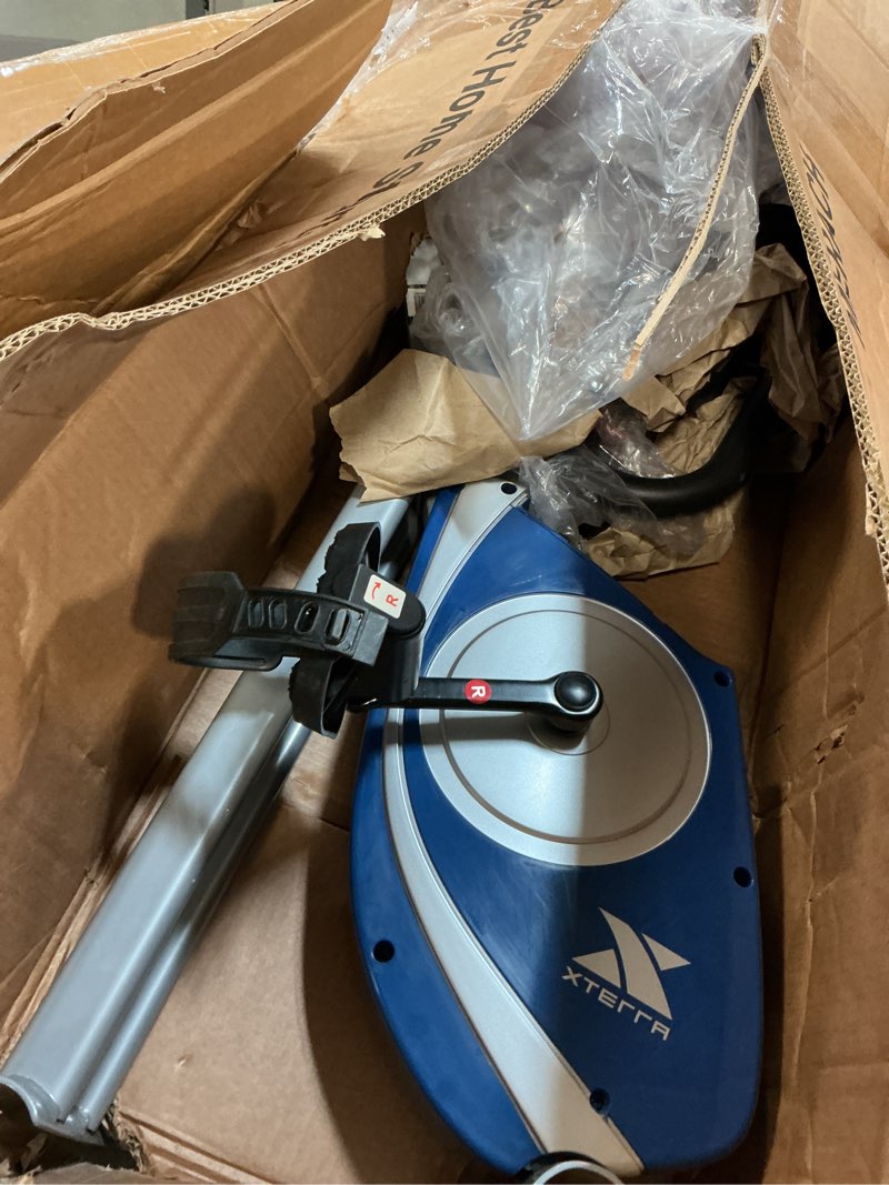 Condition photo showing As Is for XTERRA Fitness Folding Exercise Bike, 225 LB Weight Capacity, Cordless, Battery Powered with Solid X