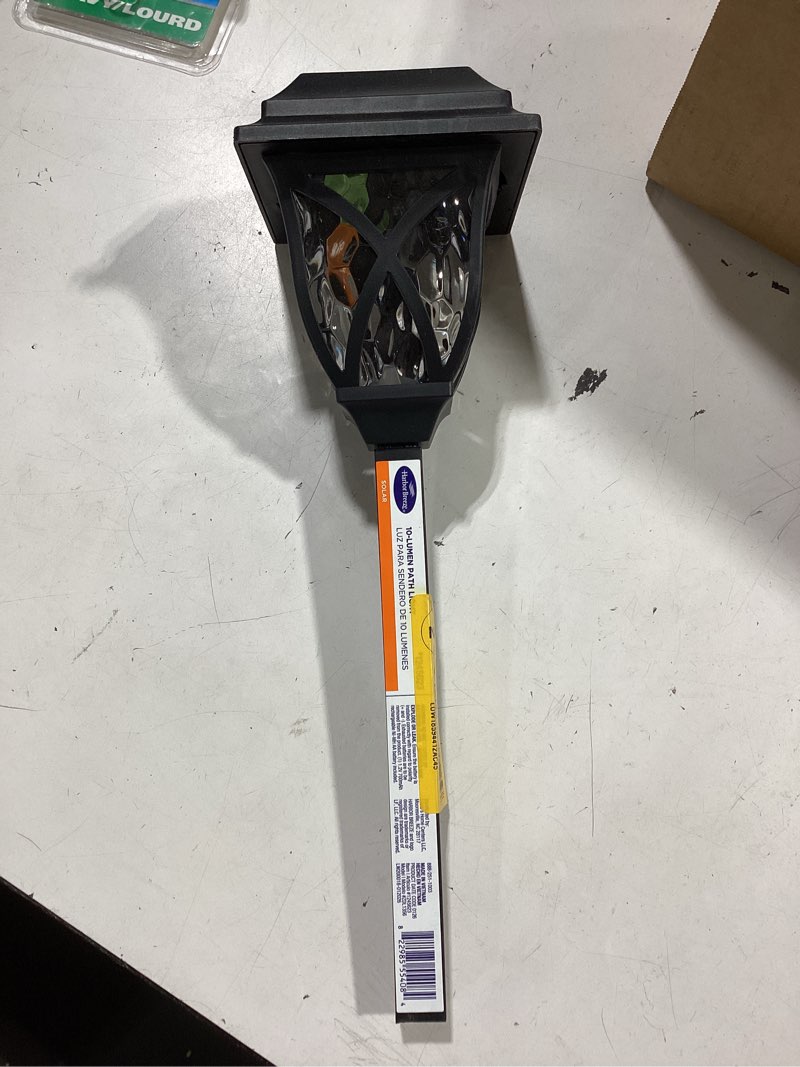 Condition photo showing As Is for harbor breeze 10 -lumens black solar led outdoor path light 3000-k