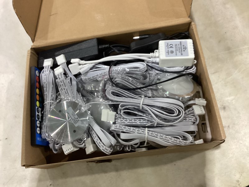 Condition photo showing Good Condition for under cabinet lights, rgbw ultra slim puck lighting kit 12 pack, dimmable counter showcase kitchen lighting fixtures, puck lights with remote and 12v plug in adapter