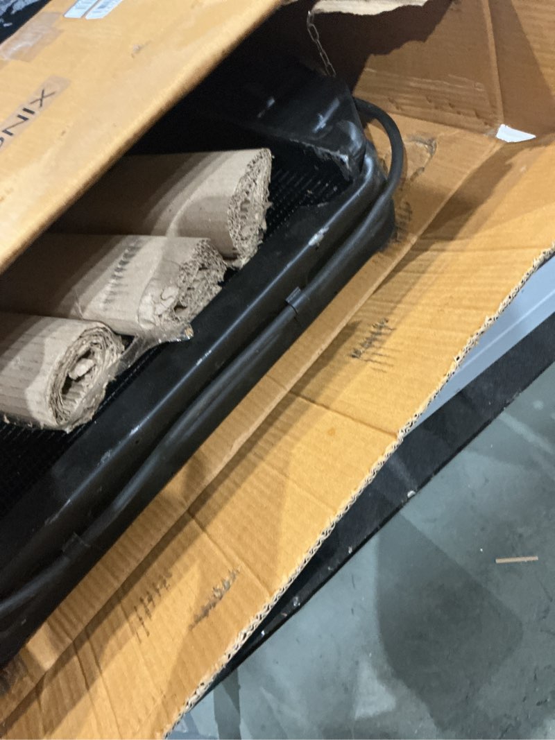 Condition photo showing As Is for c7nn8005h radiator compatible with ford 2000, 2600, 3000, 3400, 3500, 4000, 4100, 4400 tractors | fits farmtrac 545, 555 new holland 3-cyl 2300, 230a, 2310, 233, 234, 2610, 2810, 2910 | e0nn8005md15m | 4-row heavy duty copper-brass core | 9 fins per inch | oem bolt-on fit | includes pressure cap | 1-year warranty
