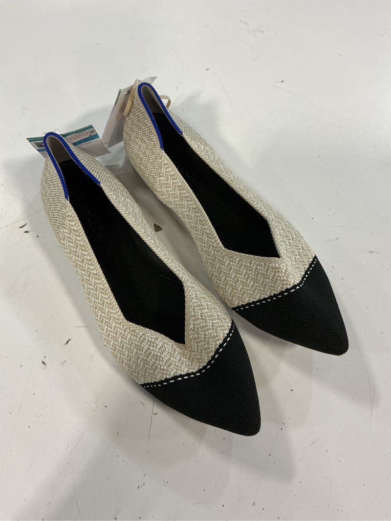 Condition photo showing Good Condition for rothy's pointed toe tuxedo flats in cream and black size 6 