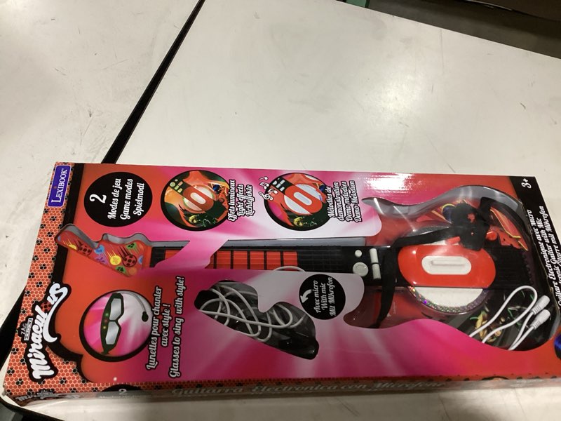 Condition photo showing New/Like New for lexibook miraculous electronic lighting guitar with mic, glasses with microphone, demo songs, 2 game modes, mp3 plug, black red, k260mi