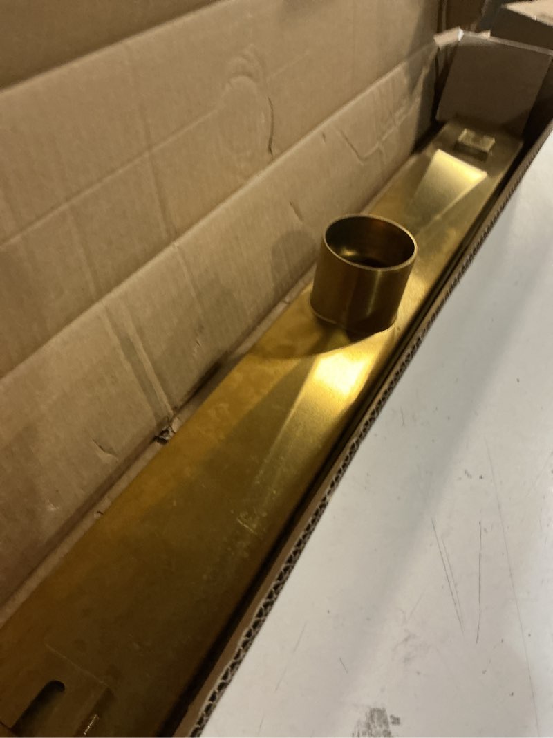 Condition photo showing Good Condition for brushed titanium gold shower drain 24 inch, 304 stainless steel linear shower drain with removable brick pattern grate - adjustable rectangular shower floor drain with hair strainer, linear drain brushed titanium gold 24 inch