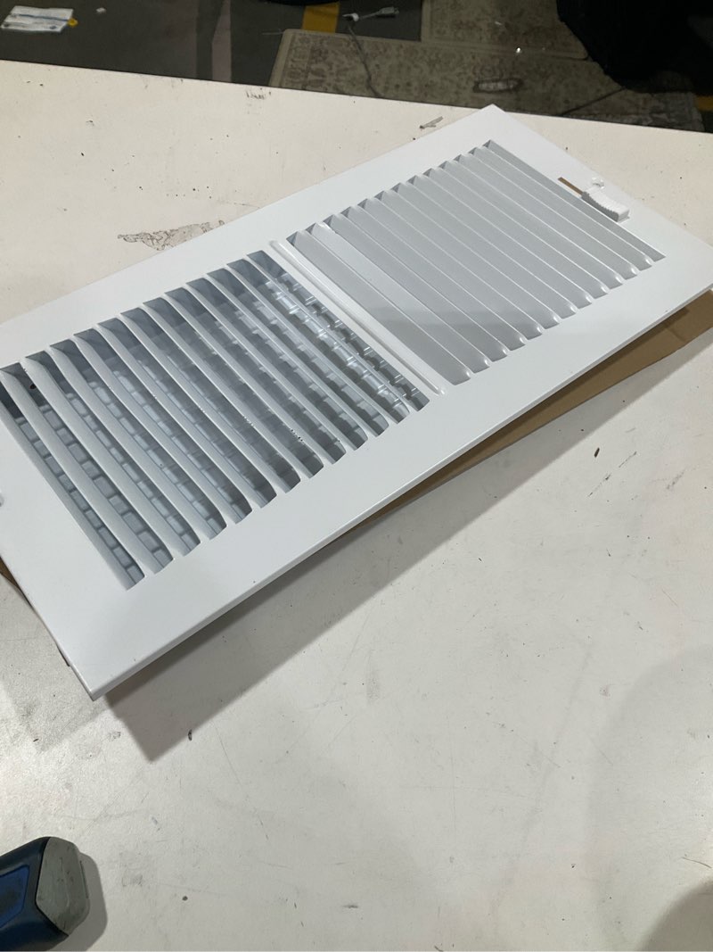 Condition photo showing As Is for reliabilt 14-in x 6-in 2-way aluminum white sidewall/ceiling register