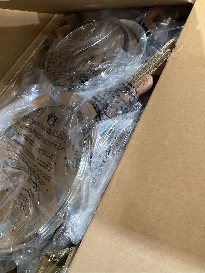 Condition photo showing Good Condition for 24 pcs pots and pans set non stick ceramic cookware set with 3 stockpots, white interior black exterior, healthy non-toxic, large capacity, induction compatible, pfas/ptfe/pfoa free 24pcs set black/white